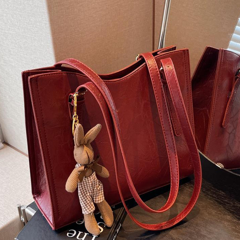 🐰Women's Trendy Shoulder Bag with Doll Pendant